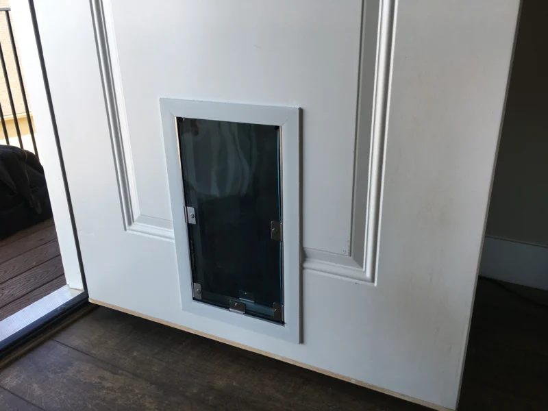 Dog Door - Door Model designed for easy access for your pet, providing a secure and durable solution for allowing your dog to enter and exit freely through the door.